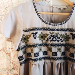 Embroidered Peplum Top